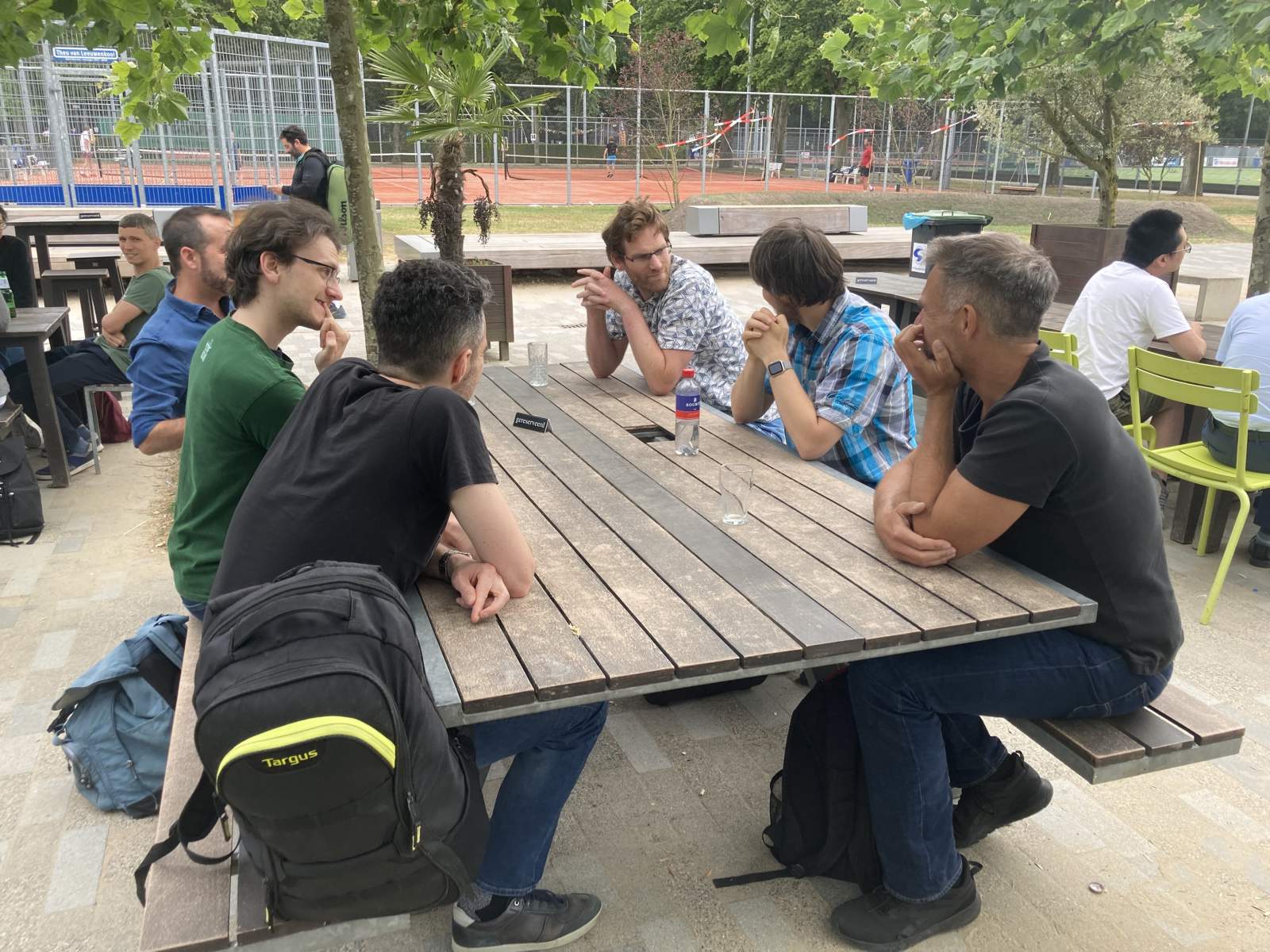 Participants enjoying drinks before the BBQ.